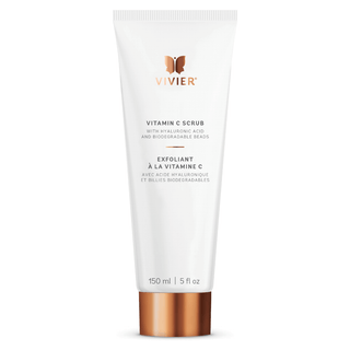 A white tube labeled "VIVIER, Vitamin C Scrub - with Hyaluronic Acid and Biodegradable Beads,” with a rose gold cap, containing 150 ml or 5 fl. oz. of product