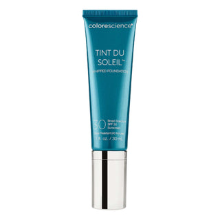 A blue tube labeled "Colorescience, Tint Du Soleil Whipped Foundation, Broad Spectrum SPF 30 Sunscreen (Water Resistant)," with a silver cap, containing 30 ml or 1 fl. oz. of product