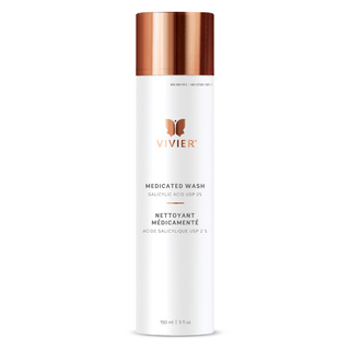 A white bottle labeled "VIVIER, Medicated Wash - Salicylic Acid USP 2%," with a rose gold cap, containing 150 ml or 5 fl. oz. of product