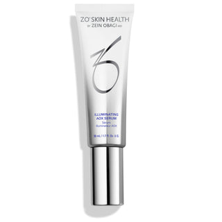 A white and silver tube labeled "ZO Skin Health by Zein Obagi MD, Illuminating AOX Serum," with a silver cap, containing 50 ml or 1.7 fl. oz. of product