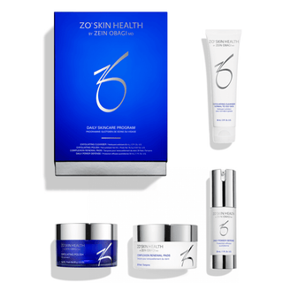 A collection of ZO Skin Health products including Exfoliating Polish, Complexion Renewal Pads, Daily Power Defense, and an Exfoliating Cleanser - Normal to Oily Skin, neatly arranged with a blue product box.