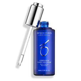 A blue glass bottle labeled "ZO Skin Health by Zein Obagi MD, Complexion Clarifying Serum," with a silver dropper cap, containing 50 ml or 1.7 fl. oz. of product